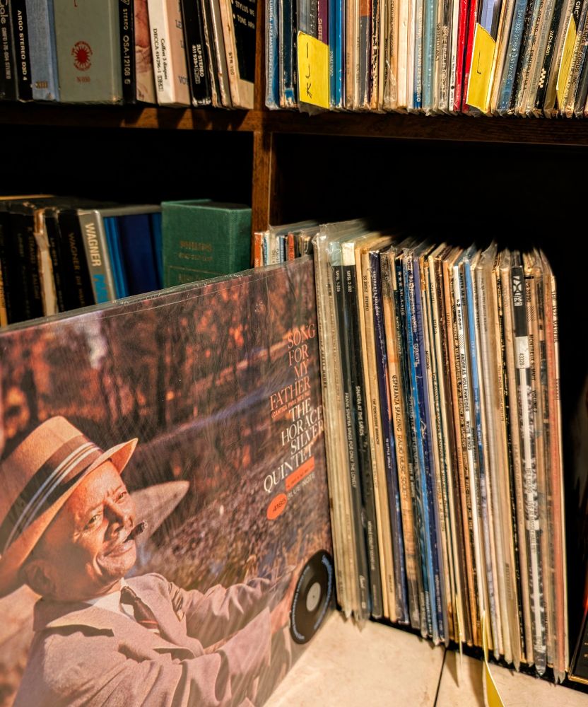 Horace Silver Quintet 'Song For My Father' album cover pulled from shelf
The cover artwork features a photograph of Silver's father, John Tavares Silver, in a suit and hat, smoking a cigar by a pond on an autumn day

Selection from Dad's Collection