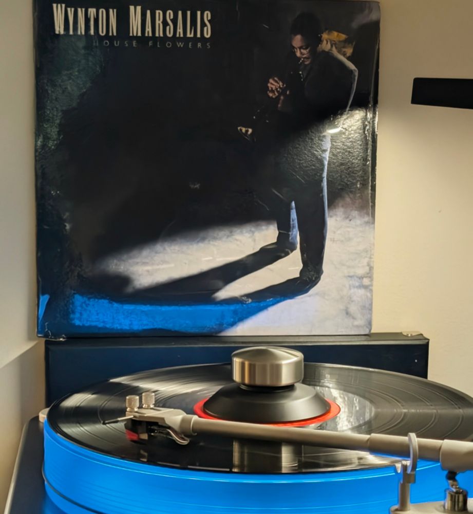 Wynton Marsalis’ Hot House Flowers Playing on VPI Scoutmaster turntable, 12-pound acrylic platter glowing blue

Cover is photo of Marsalis playing on a starkly lit stage

Selection from Dad's Collection
