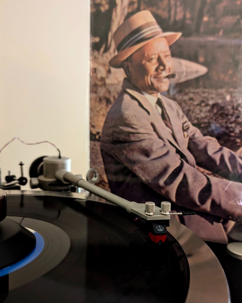 Horace Silver Quintet 'Song For My Father' album playing on VPI Scoutmaster turntable with perimeter ring clamp around the edge of the record.

Audio Technica AT-VM95ML cartridge.

The cover artwork features a photograph of Silver's father, John Tavares Silver, in a suit and hat, smoking a cigar by a pond on an autumn day

Selection from Dad's Collection