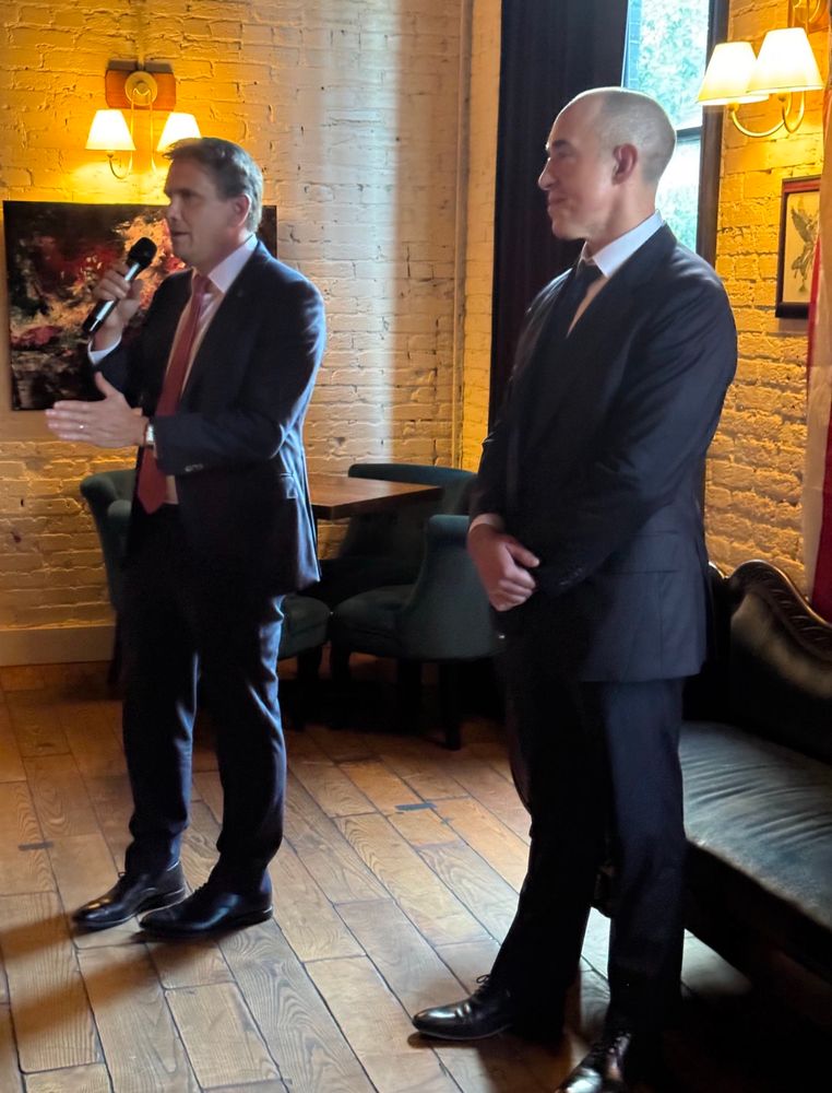 Todd Blanche gives remarks at Butterworth’s. He’s wearing a suit and speaking into a microphone next to Bove 

Photo credit: Mike Davis/Article 3 project on Twitter