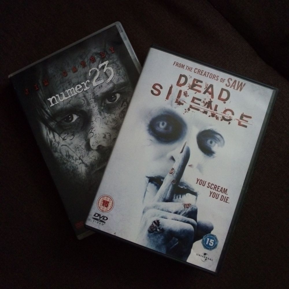 Photo of two DVD boxes of movies: The Number 23 (Polish version, with title "Numer 23") and Dead Silence (English version) 