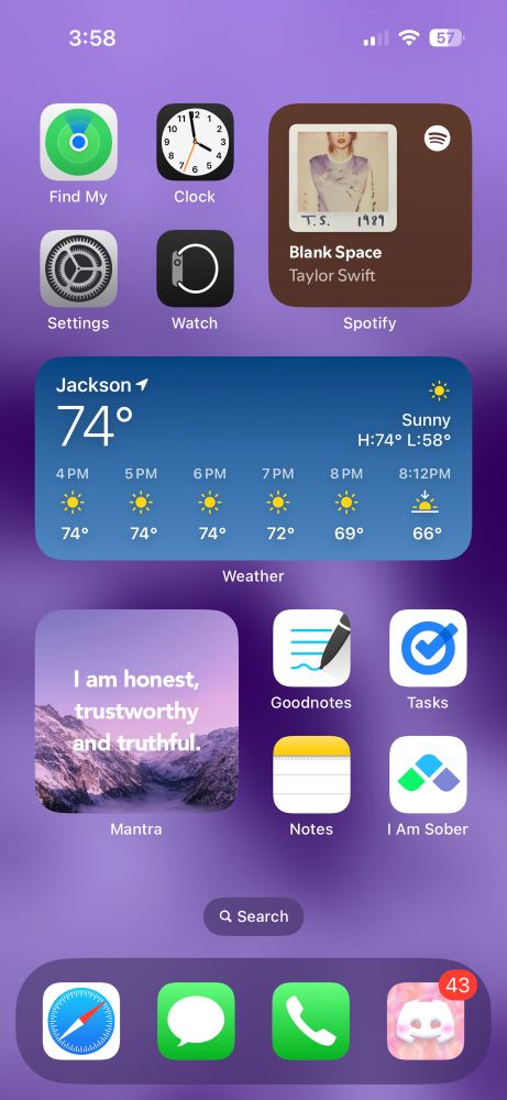 A screenshot of a phone, in the upper left corner is a Spotify widget playing blank space 