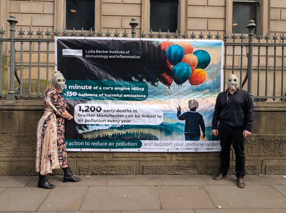 Lydia Becker Institute Banner at Manchester Art Gallery for Our Manchester Our Air event- 1 minute of a car's engine idling= 150 balloons of harmful emissions. 1200 early deaths in Greater Manchester can be linked to air pollution every year. Take action to reduce air pollution and support your immune system.