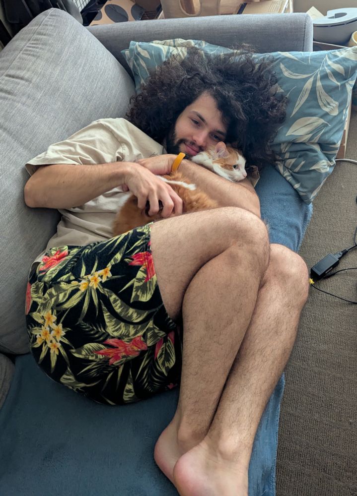 a cool guy cuddling a cat - she knows nothing of the sea. to face the sea without knowledge is certain death. she has no knowledge because she has spaghetti for brains