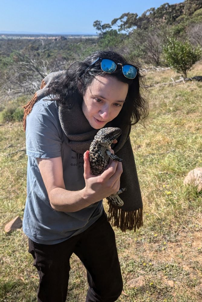 Charlie politely acquiesces a blue tounge. It had a shitload of ticks and he got most of them off the absolute mad man