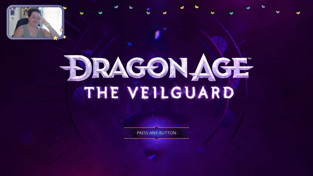A screenshot of the Dragon Age: The Veilguard pre-loading screen. In the top left corner is Jay. They're doing a half-heart against their cheek with their eyes closed. They're wearing a sage green knit tank top. 