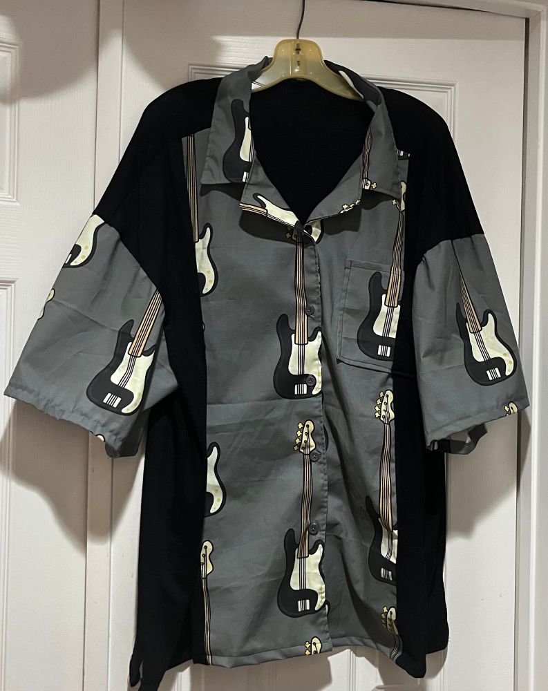 Handmade Hawaiian-style shirt with bass guitar pattern, plus wide, black stripes on the front