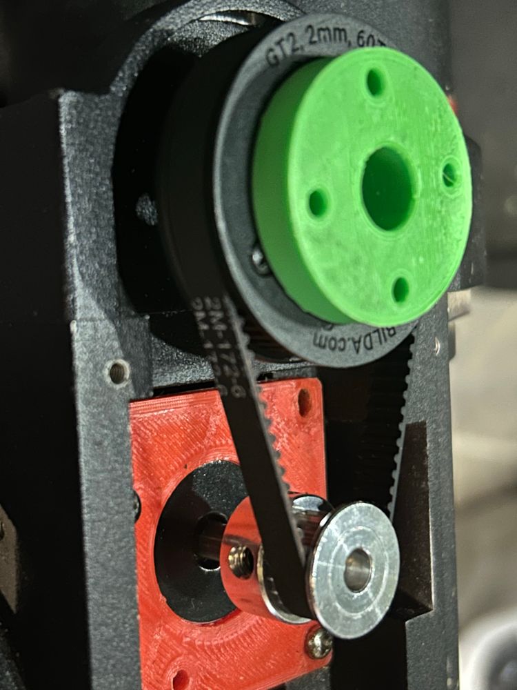 A HEQ5 equatorial mount that with a 3D printed bracket to fit a standard Nema14 stepper, the larger pulley also has a 3D printed hub adaptor