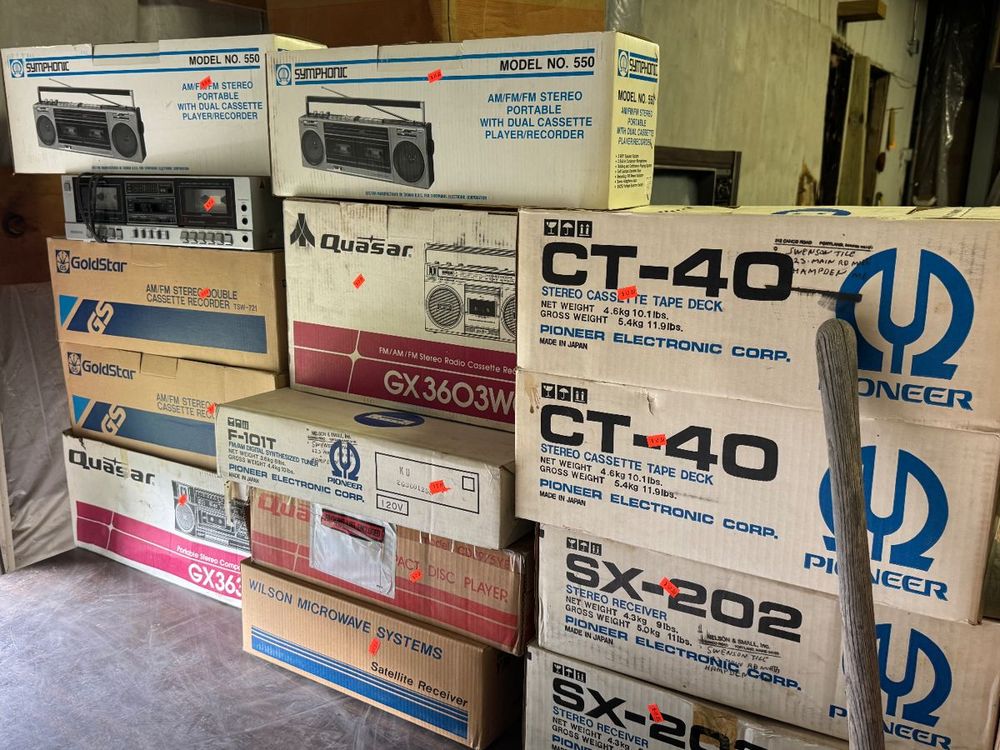 vintage stereo equipment in boxes