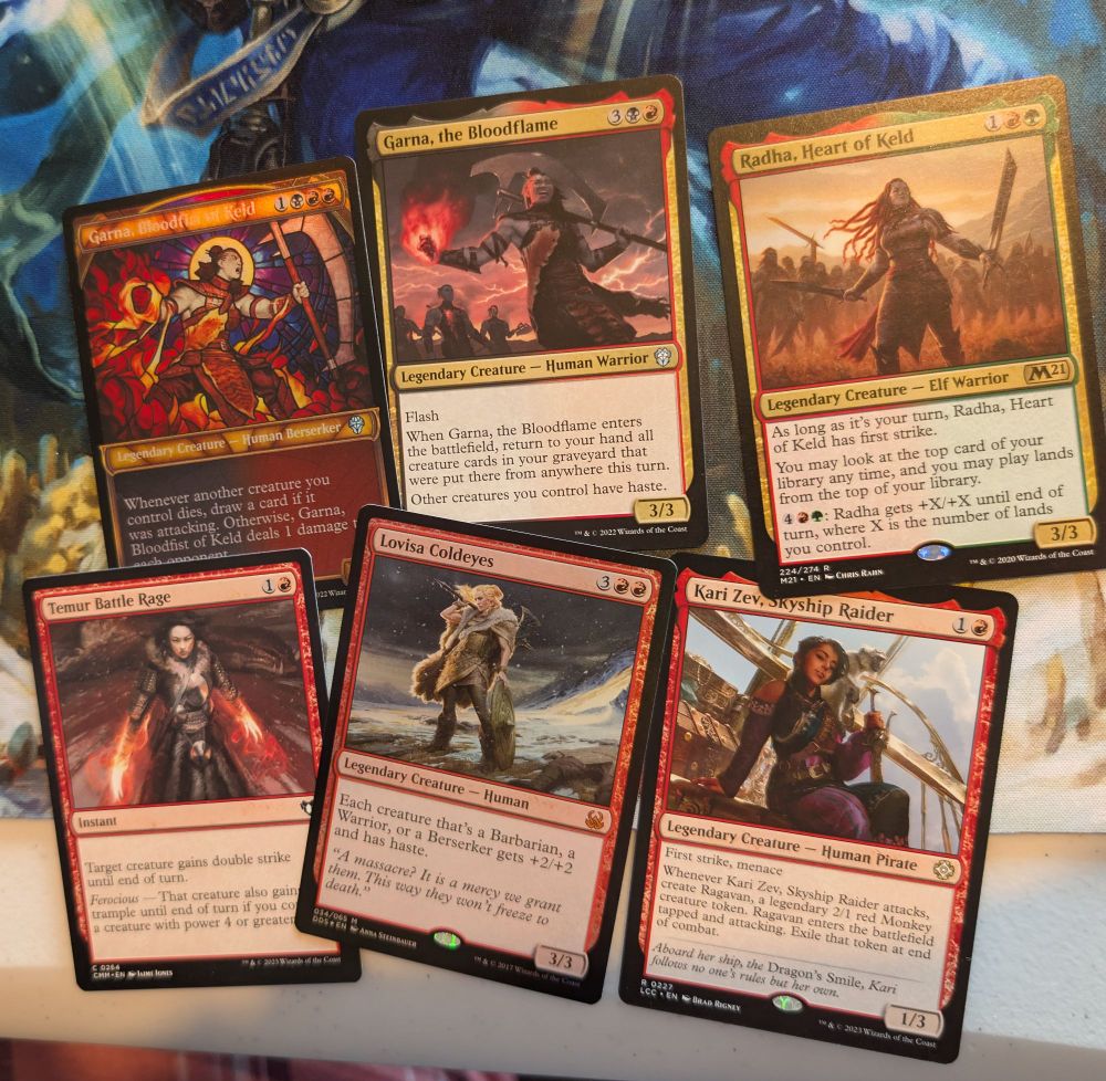 Six magic the gathering cards. They're mainly red barbarians (and one red pirate) and they all look like they top.