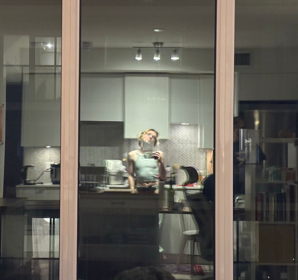 window reflection selfie