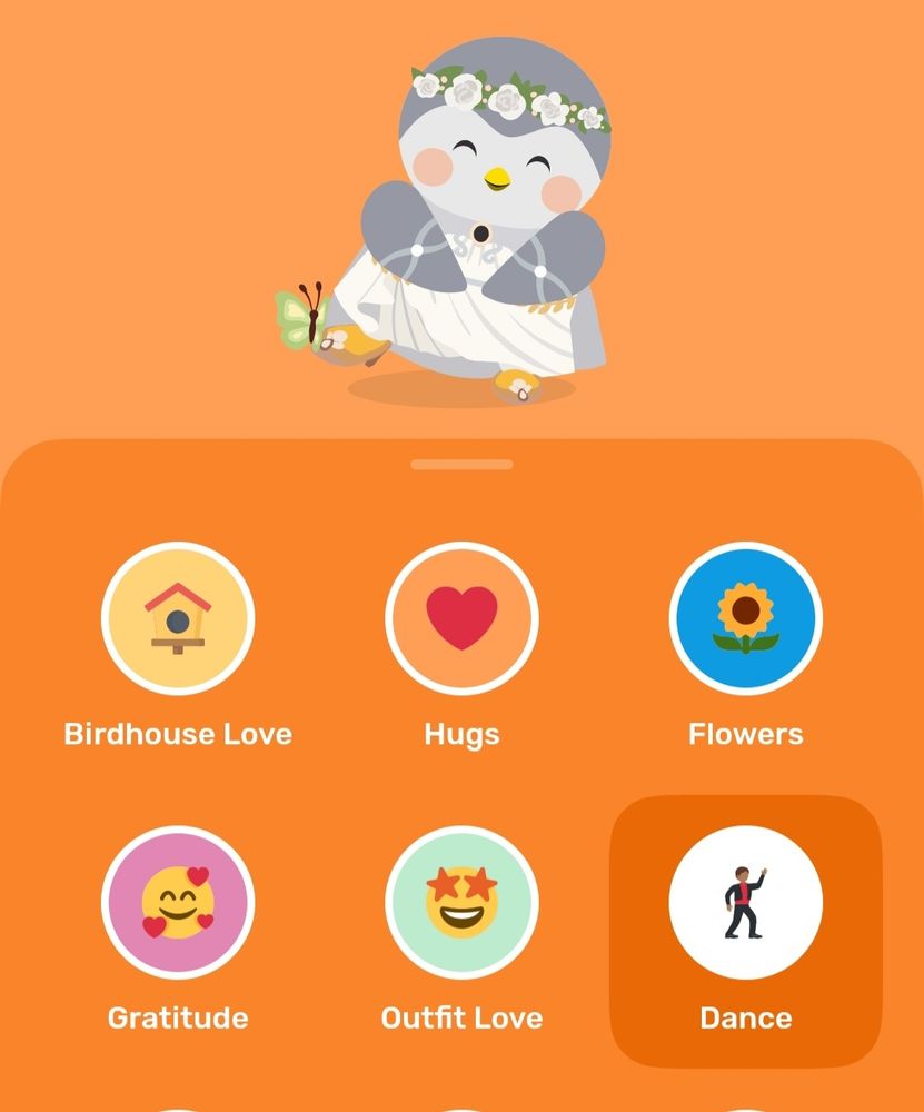 Animated Grey bird in a white dress & cape and white blossom flower crown selecting a "dance" interaction to send a friend
