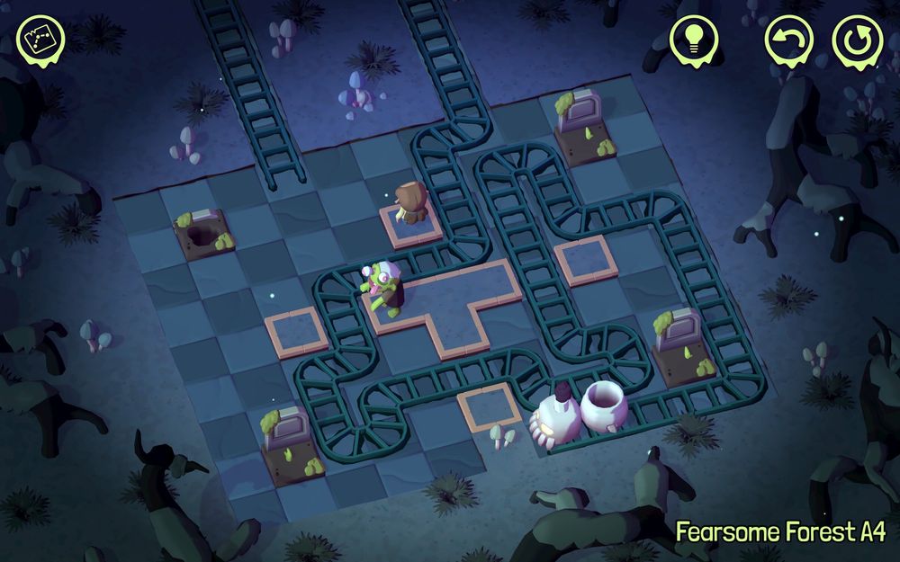 A grid with rails across it, upon which is a short one-carriage train whose engine resembles a skull. There are four graves, a zombie and a small boy waiting to be picked up.