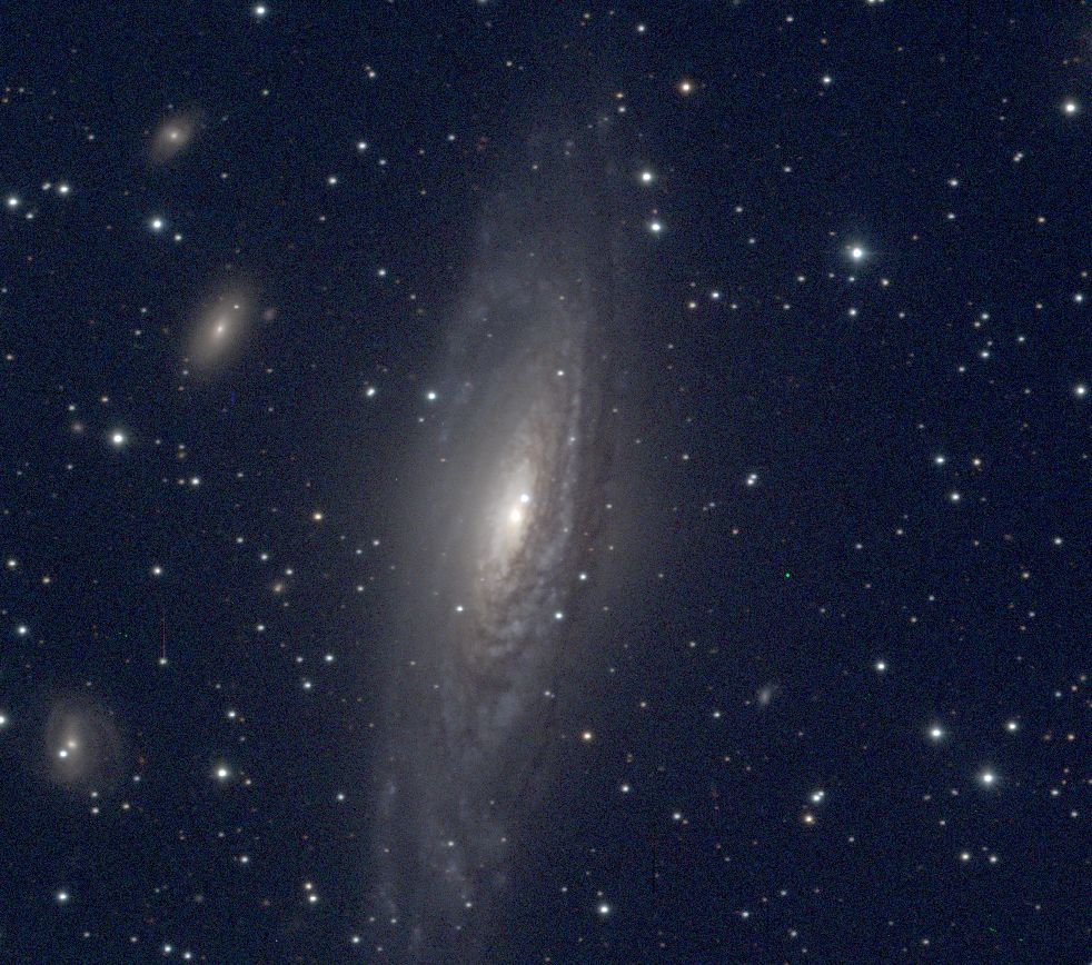 Spiral galaxy NGC 7331, seen highly inclined with feathery dust lanes augmenting the tightly-wound spiral pattern. Bright star above nucleus is type Ia supernova 2025rbx, discovered early this month.
