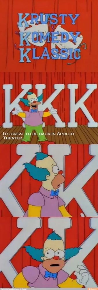 Krusty the clown standing in front of his unfortunate Krusty Komedy Klassic sign 