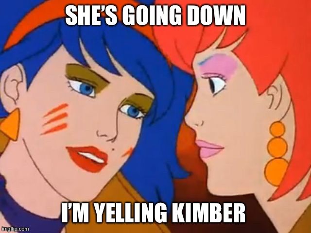 An image of Stormer and Kimber from Jem and The Holograms captioned “She’s going down, I’m yelling Kimber.”