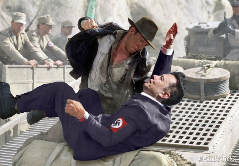 A scene from the film Indiana Jones and the Last Crusade, where Indy is punching a Nazi. Elon Musk's face, blue suit, and seig-heiling arm have been photoshopped into the picture.
