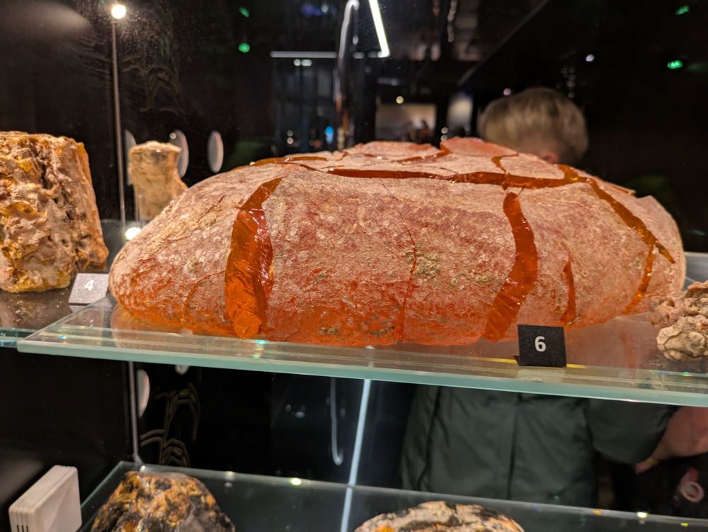 A huge piece of amber that kind of resembles a big loaf of farmhouse bread 