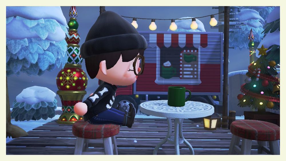 My character is sitting in a chair sniffing her cup of coffee. Hehe. During Christmas times I love hot peppermint lattes so let's imagine thats what it is. This area is pretty with a small Christmas tree and some lights. Plus a truck to buy your coffee at. 