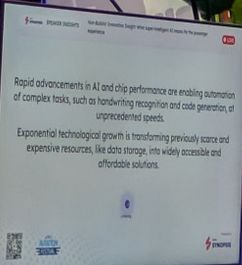 A blurry close up of a monitor with words on it. It reads:

Rapid advancements in AI and chip performance are enabling automation of complex tasks, such as handwriting recognition and code generation, at unprecedented speeds.

Exponential technological growth is transforming previously scarce and expensive resources, like data storage, into widely accessible solutions.