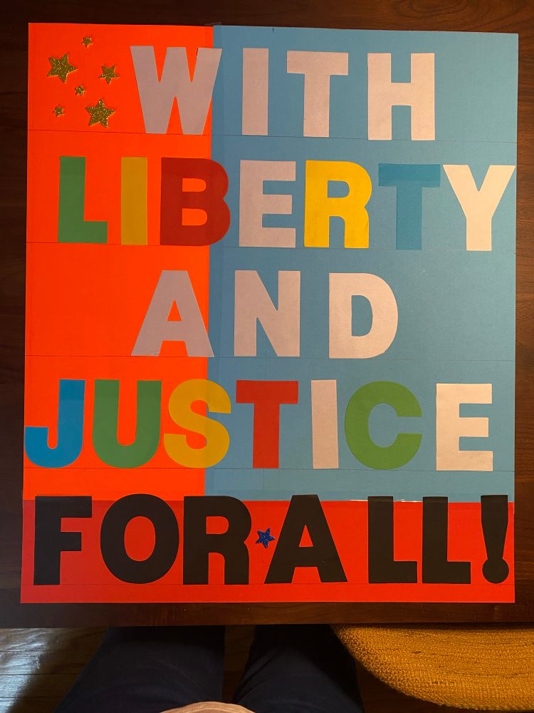 Poster reads
WITH
LIBERTY
AND
JUSTICE
FOR ALL!