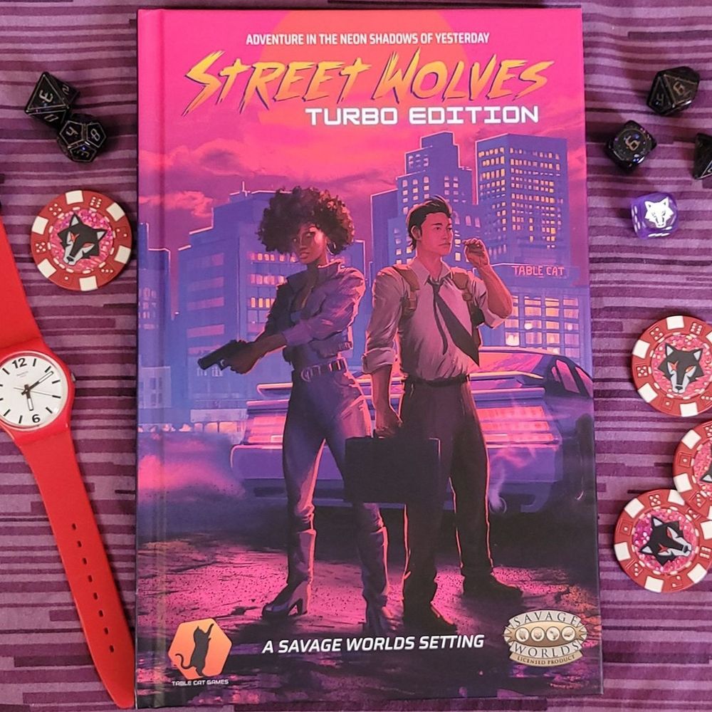 Picture of the Street Wolves book with poker chips around it, a die with a wolf face, and a swatch.