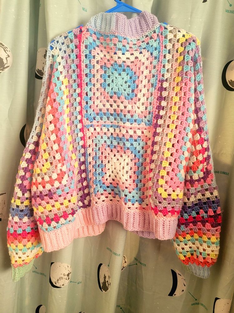 Crochet granny cluster cardigan of many pastel and candy colors back