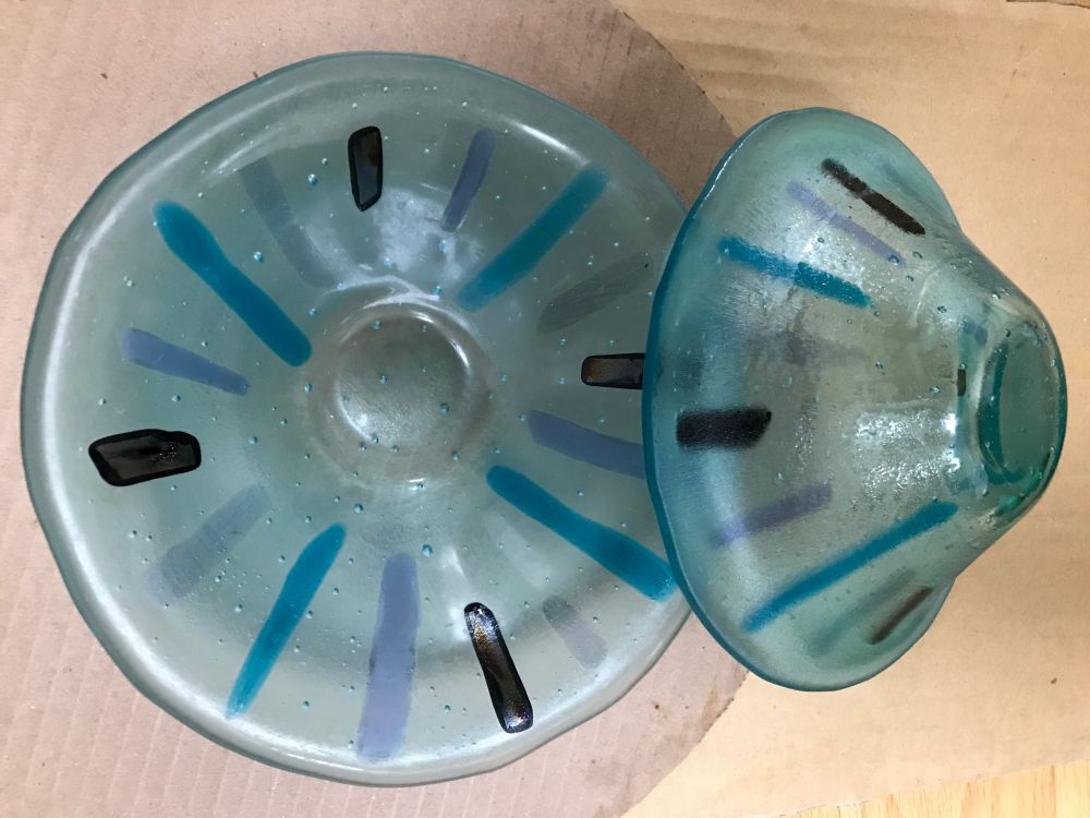 Slumped Glass art— Two bowls— turquoise with blue, black, and lavender.  Success!
