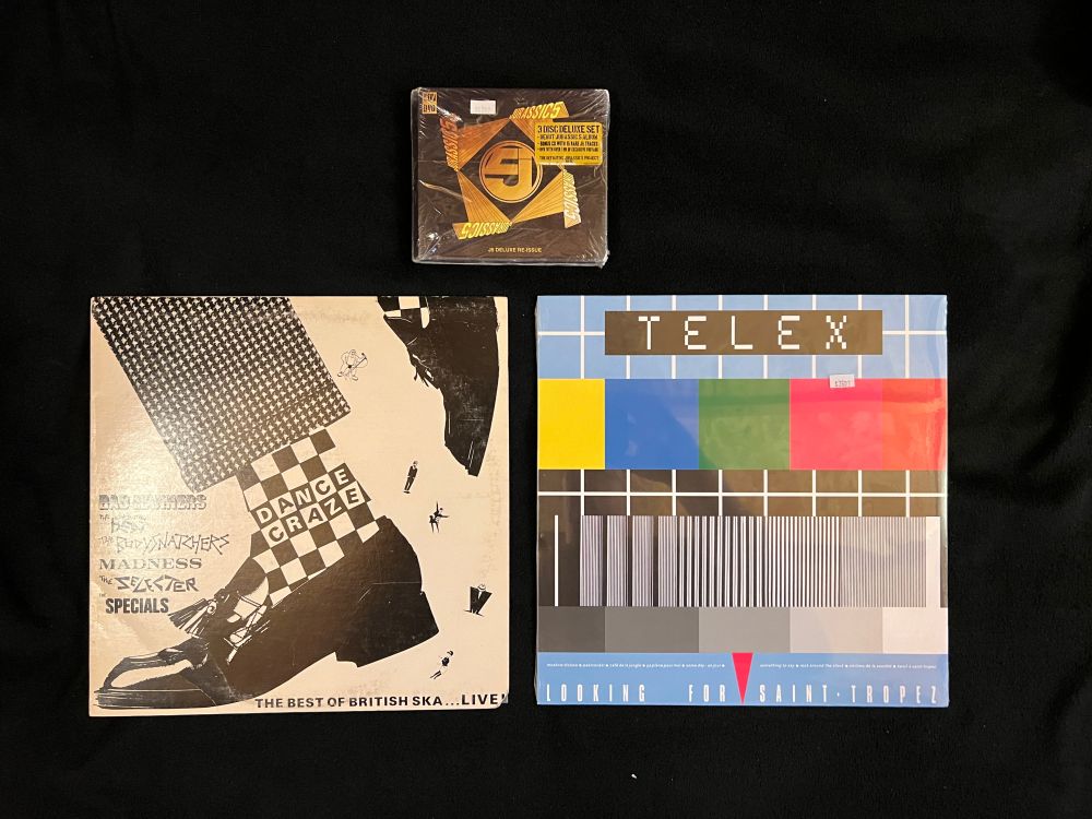 A CD copy of Jurassic 5's self-titled debut.  A vinyl copy of "The Best in British Ska" Compilation.  A vinyl copy of "Looking for Saint-Tropez" by Telex.
