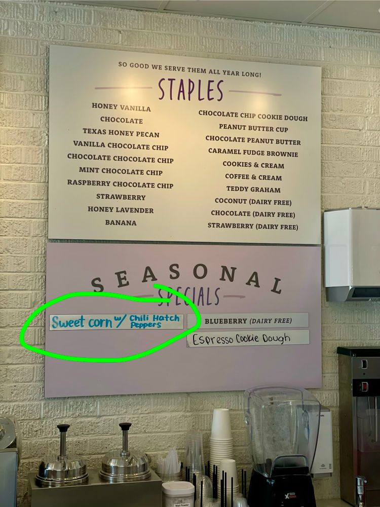An ice cream menu with the flavor “Sweet corn w/ chili hatch peppers” circled for emphasis 