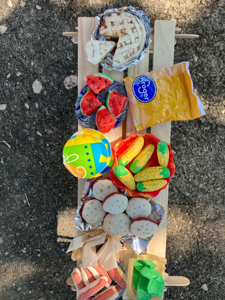Doll food made from salt dough-- watermelon, hot dogs, burgers, apple pie, corn on the cob