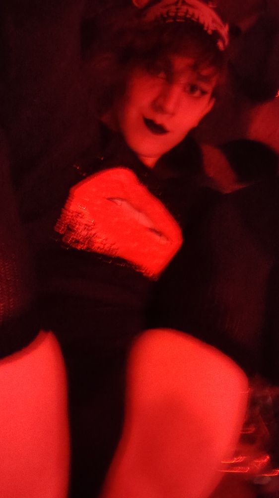 Me in a shirt, thigh highs and underwear with my legs held up ready for a mating press