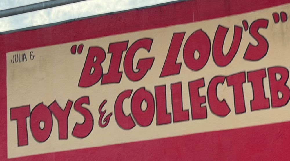 Tiny print for "Julia &" next to giant "BIG LOU'S"