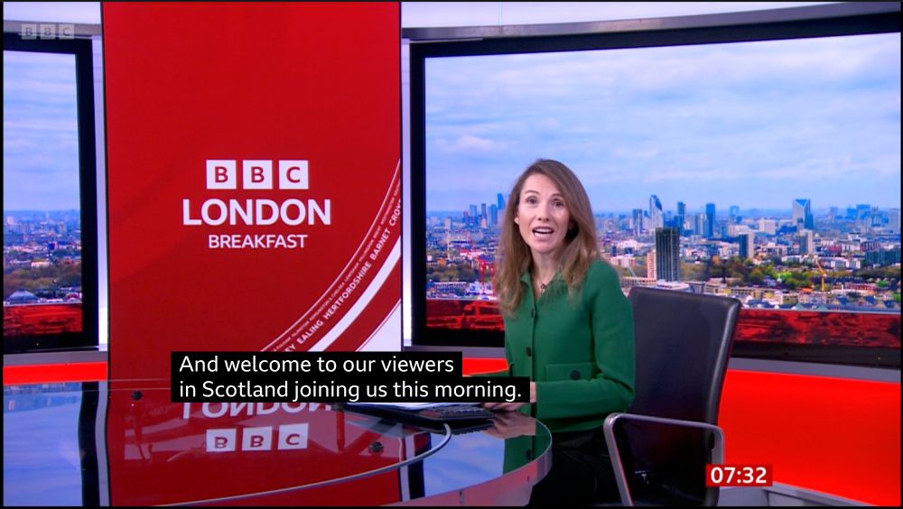 A screenshot of the BBC London news at 0732 this morning.  The presenter, Nicky Ford, is wearing a green jacket and sitting on a black chair.  There is a BBC LONDON BREAKFAST logo to the left of the image.  Subtitles read "And welcome to our views in Scotland joining us this morning"