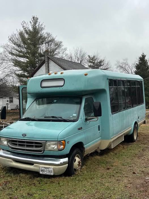 Blue 2001 Ford E-450 Shuttle Bus