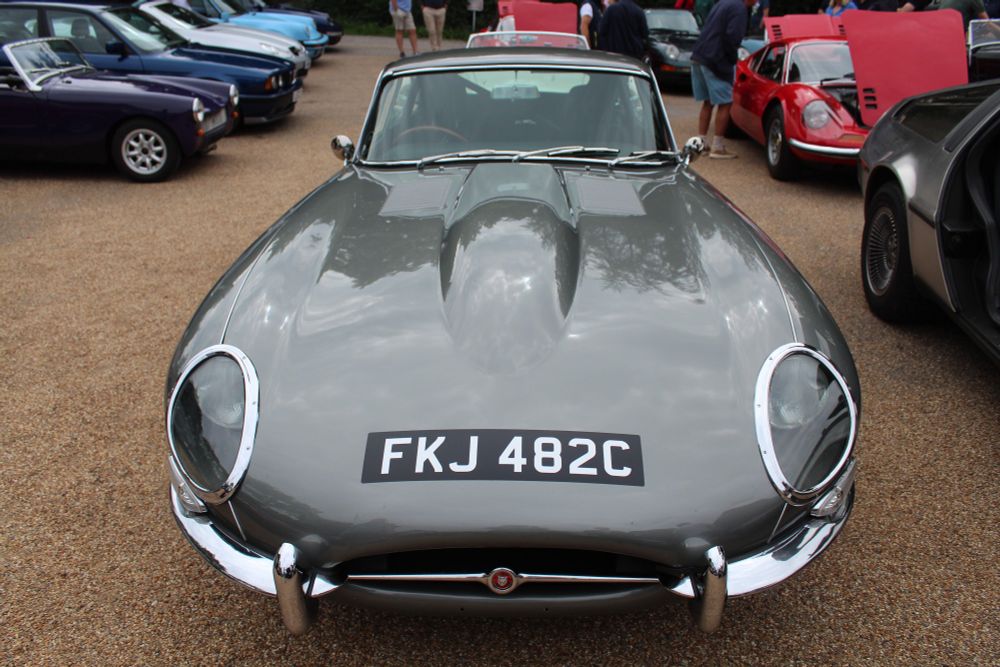 A grey Jaguar E-Type. 