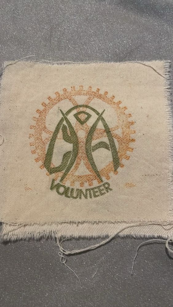 Image of a cream colored patch with raw frayed edges. On the patch in dark ink the Gateway Burners logo of the Burningman logo combined with the gateway arch and the river convergence of the Mississippi and the Missouri that is part St Louis, MO logo. Behind the logo in lighter brown ink is a gear to signify our theme this year which leans heavily into steampunk. Burning through Time 
Here is how to sign up for shifts 
https://gatewayburners.org/volunteer-opportunities/?fbclid=IwZXh0bgNhZW0CMTEAAR7cssleDsgMtjS-yrs3HfdyauiXycHHUqaqAY6RpQtObrVBmOlC2dWI1jvzPA_aem_oeEow7lWCDYre4emWjLJkQ