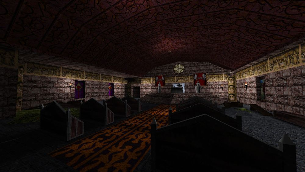 An alter room lined with pews. Two banners depicting crossed hammers hang at the end of the room behind the altar. The room is becoming overgrown with grass and moss.

Screenshot by Scoop
