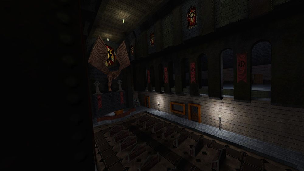A large cathedral hall. A massive winged angel statue looms over the room filled with pews.
Screenshot by scoop