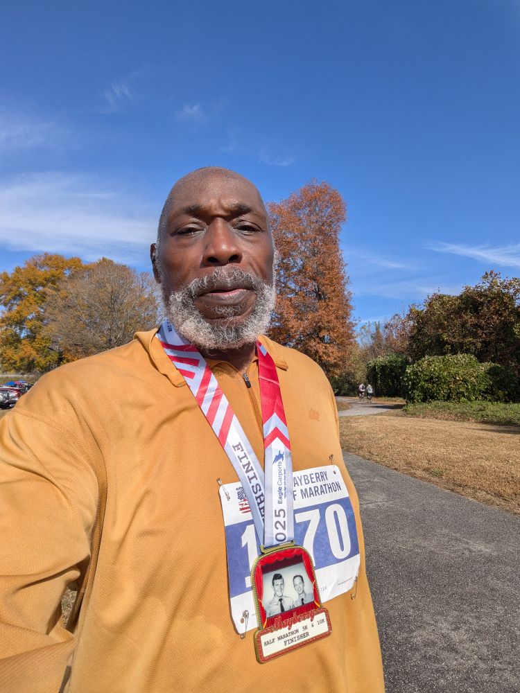 Ray with finisher's medal for Mayberry Half-marathon 