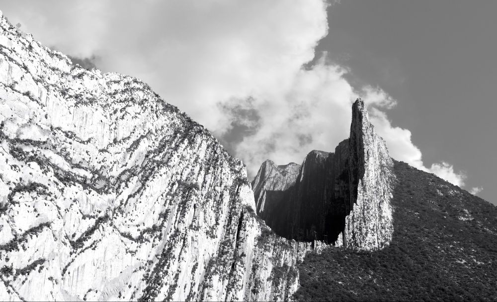 Black and white photo of the Sierra Madre Oriental mountain range in La Huasteca park in Monterrey, MX
