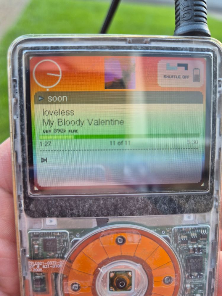 iPod 5.5 with rockbox and notgray theme (orange and green) , playing soon, my bloody valentine - 890k flac