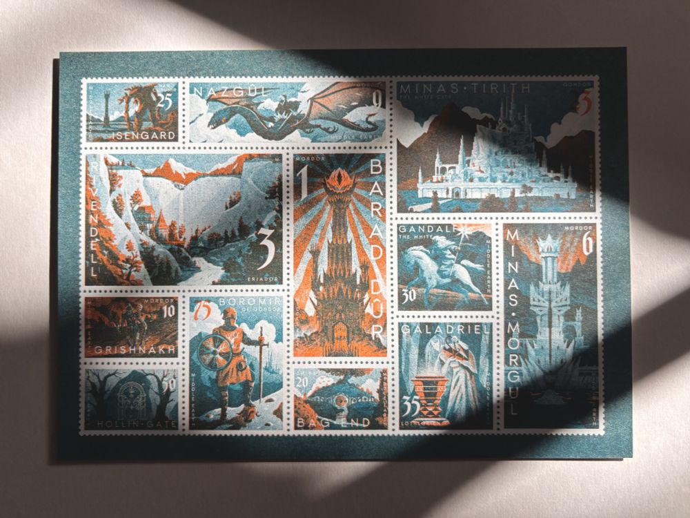 Flatlay photograph of a risograph print with harsh diagonal light falling over it.

The print is an illustrated stamp-set of scenes and characters for the Lord Of The Rings by JRR Tolkien in overlapping orange and teal rise ink.