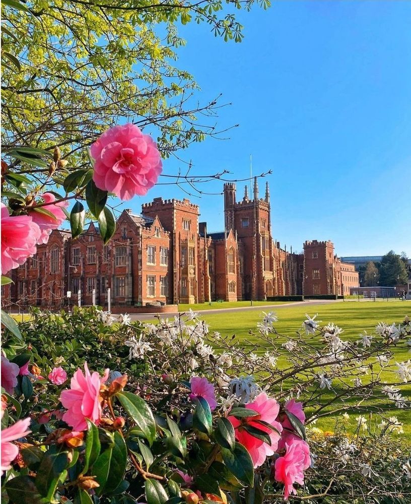 Queen's University Belfast Lanyon Building with flowers in the foreground 