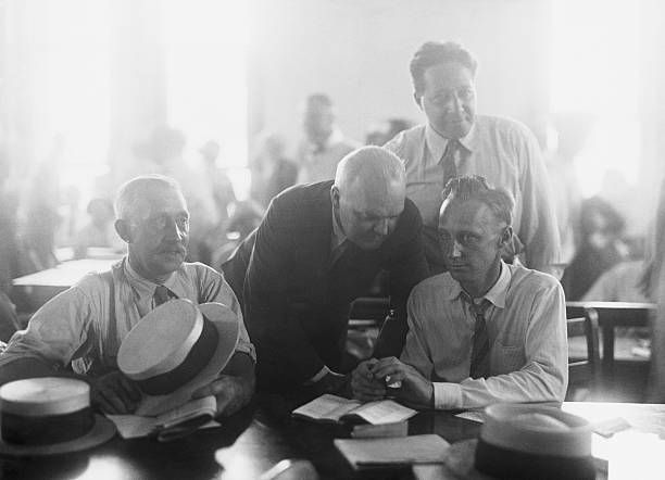 John T. Scopes (far right) with, from left, his father, Thomas Scopes, and defense counsels Dudley Field Malone and Arthur Garfield Hays