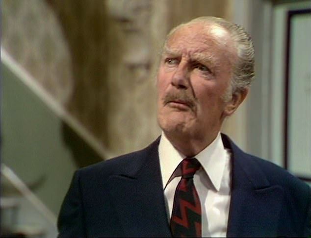 The Major in Fawlty Towers looks quizzically at someone off camera