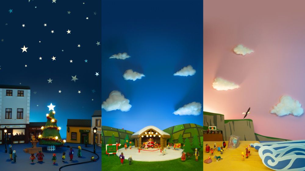 A triptych featuring:
A town square with a Christmas tree
A Santa's grotto with sheep
A group going for a Christmas day sea swim