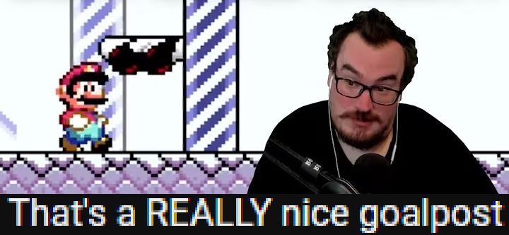 BarbarousKing looking at a goal post from SMW with breasts and a bra