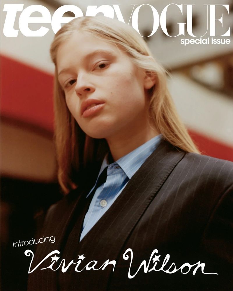 Vivian Wilson on the cover of Teen Vogue, with the headline “Introducing Vivian Wilson”. It’s a close up shot of her looking at the camera in a black suit jacket and blue button down
