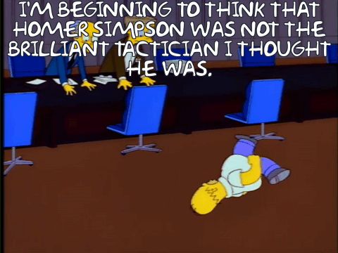 Homer Simpson running in circles on the ground